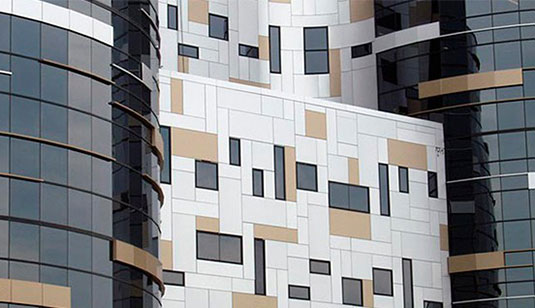 Aluminum composite panel facade with mixed panel colors and open reveals