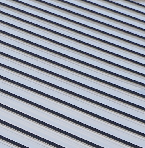 Light gray standing seam roof panels