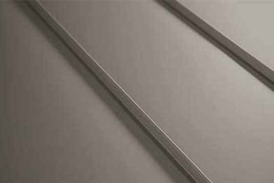 Close view of a standing seam joint between two roof panels