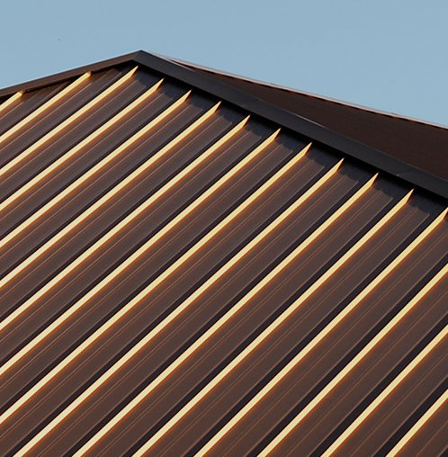 Copper-tone standing seam roof panels